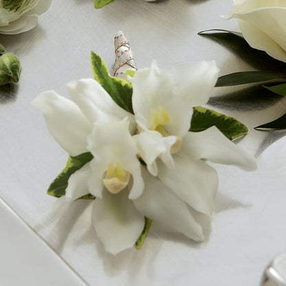 White Mini Cymbidium Boutonniere – FLORAL & SILKS, Webster NY